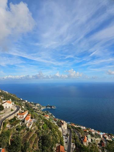 a view of the ocean from a hill at Otium Relais in Furore