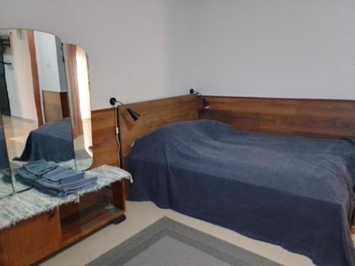 Postel nebo postele na pokoji v ubytování Káli Apartman