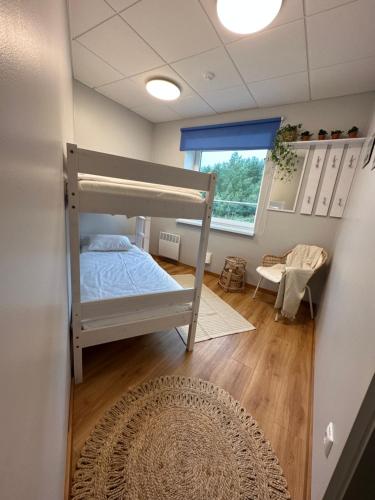 Postel nebo postele na pokoji v ubytování Österby sadamahoone