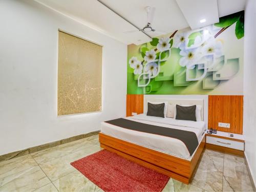 Ein Bett oder Betten in einem Zimmer der Unterkunft Collection O Mukur Hotel And Restaurant