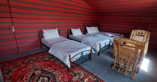 Katil atau katil-katil dalam bilik di Delight Desert Camp