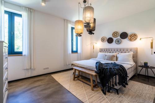 Postel nebo postele na pokoji v ubytování Glass House