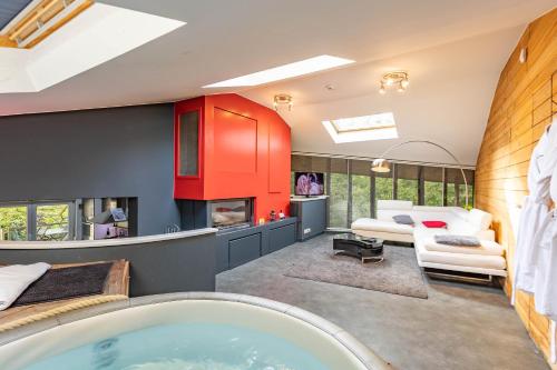 Postel nebo postele na pokoji v ubytování Le Lov't - Suite avec jacuzzi