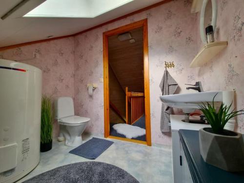 Koupelna v ubytování Gemütliche Hütte direkt am Fjord