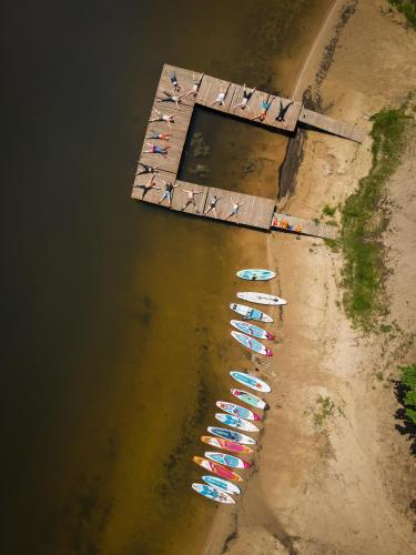 an aerial view of a dock with boats in the water at TO TU Chańcza Mały Domek z Balią in Raków
