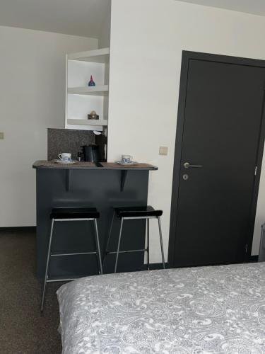 Postel nebo postele na pokoji v ubytování Impasse 3