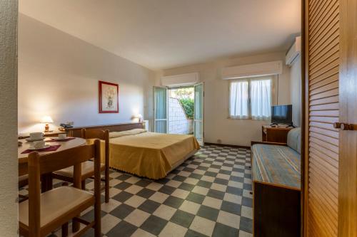 Postel nebo postele na pokoji v ubytování Giannella Beach Residence Apartment