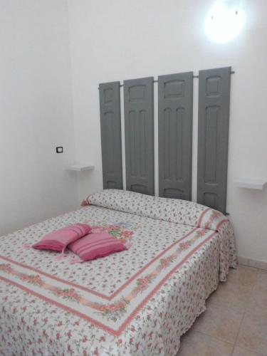 Cama o camas de una habitación en Appartamenti Scala dei Turchi