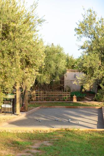 a parking lot with a bunch of skateboards in it at Villa Serena Marrakech - Maison d'hôtes in Marrakech