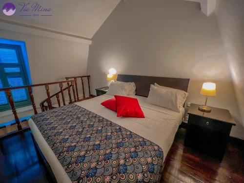 Postel nebo postele na pokoji v ubytování Via Mina Hotel