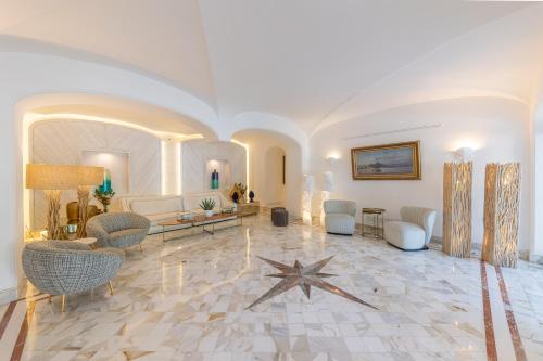 a living room with a star on the floor at Hotel Mamela in Capri