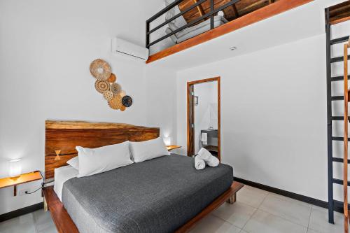 Giường trong phòng chung tại Villa Ave del Paraíso
