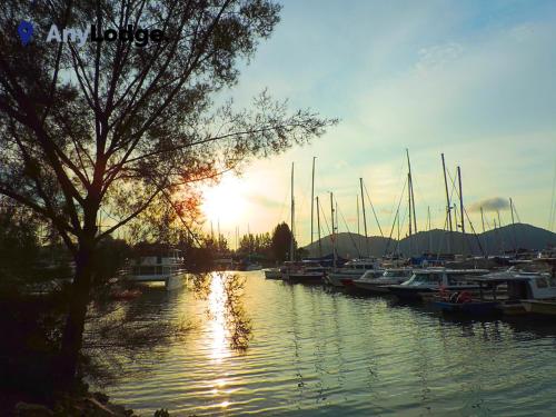 a group of boats are docked in a harbor at AnyLodge Waterfront Marina Island Pangkor in Lumut
