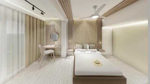 Sofia Resort Luxury Suites في جورجيوبوليس: غرفة نوم بسريرين وطاولة ومكتب