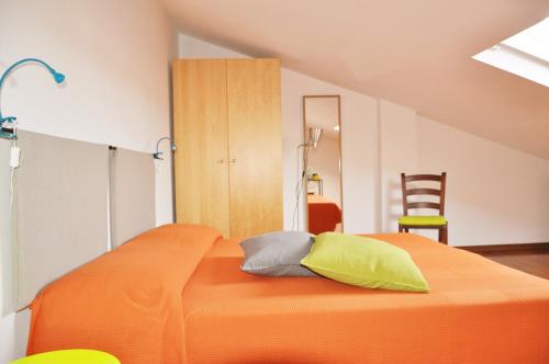 Un pat sau paturi într-o cameră la Camere Sotto le Stelle