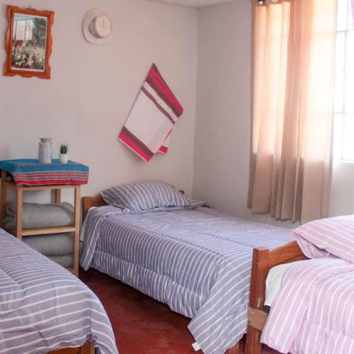 Postelja oz. postelje v sobi nastanitve Casa Mamá Vicky - Valle del Colca