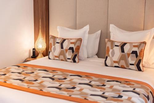 Letto o letti in una camera di Riad Nyla Wellness and Spa