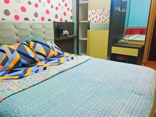 Postel nebo postele na pokoji v ubytování Yuvin rooms by Vivo Apartment