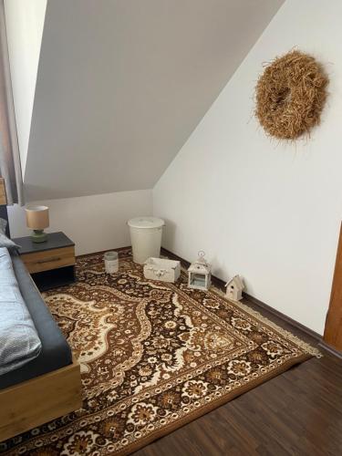 a room with a rug on the floor at Penzion U Radnice in Doksy