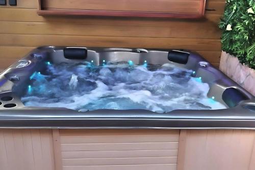 a jacuzzi tub sitting on top of a cabinet at P'ti Paradise in Le Gosier