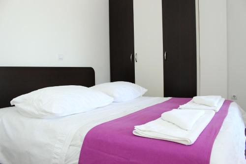 Katil atau katil-katil dalam bilik di Apartments Palma