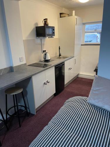 Kuchyň nebo kuchyňský kout v ubytování Apartments Azalea Terrace