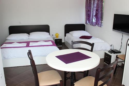Katil atau katil-katil dalam bilik di Apartments Palma