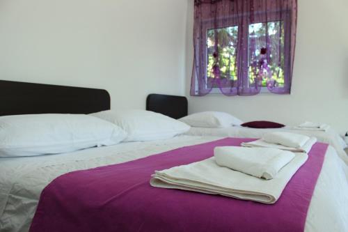 Katil atau katil-katil dalam bilik di Apartments Palma