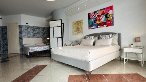 Postel nebo postele na pokoji v ubytování Amarin Pisa Room
