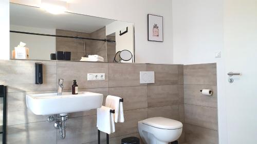 Un baño de Ferienwohnungen am Simssee, Gutshof Alpenblick