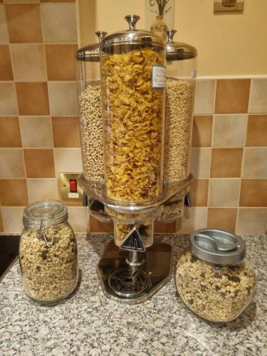 a food processor filled with oats on a counter at The Jays Guest House in Aberdeen