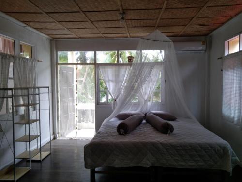 Letto o letti in una camera di The Sunset Beach House