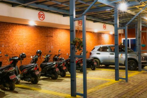 a group of motorcycles parked in a parking garage at Kalash Parkaze And Tent Inn in Pokhara