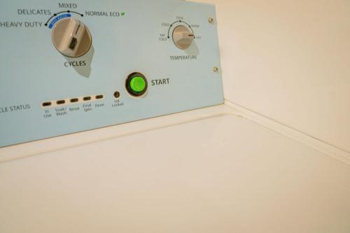 a close up of a control panel of a machine at Royal Inn & Suites in Akron