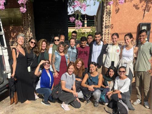 a group of people posing for a picture at Riad Rime Garden Marrakech in Marrakech