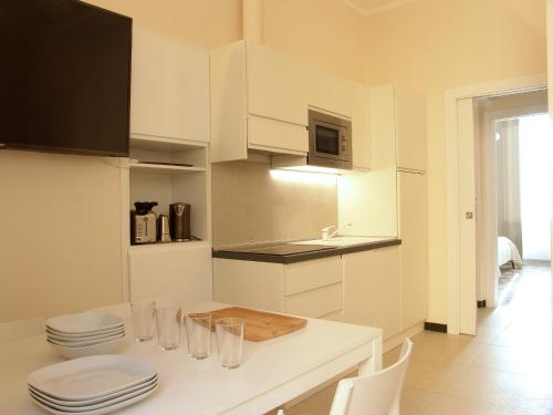 Η κουζίνα ή μικρή κουζίνα στο Residenza Cavour - Appartamento AGAVE