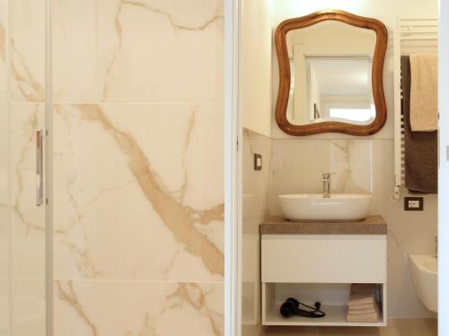 Et badeværelse på Residenza Cavour - Appartamento AGAVE