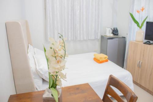 TV a/nebo společenská místnost v ubytování Vitasolo Hometel & Suite