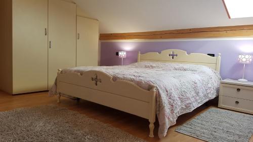 מיטה או מיטות בחדר ב-Casa MARGHERITA
