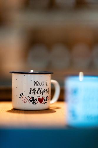 a coffee cup with the words proctor station on it at Prostě Sklípek in Starý Poddvorov