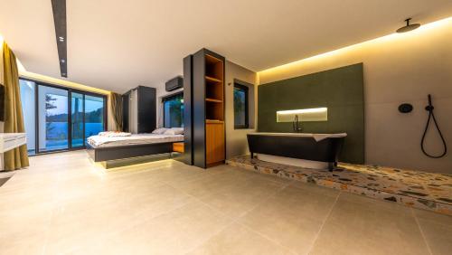 Katil atau katil-katil dalam bilik di Villa Azize