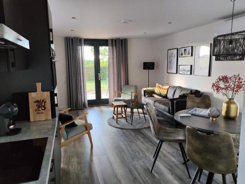 Ruang duduk di Vakantiewoningen Eyveld