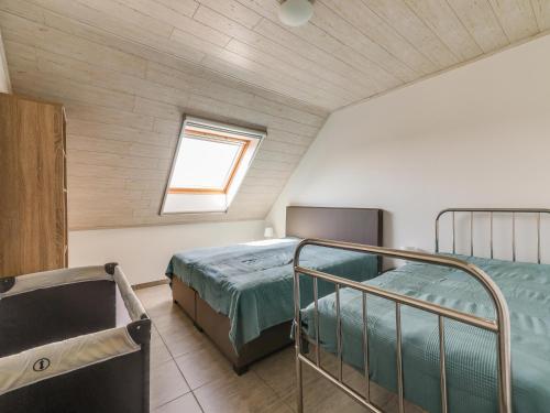 Postel nebo postele na pokoji v ubytování In de Wollekjes