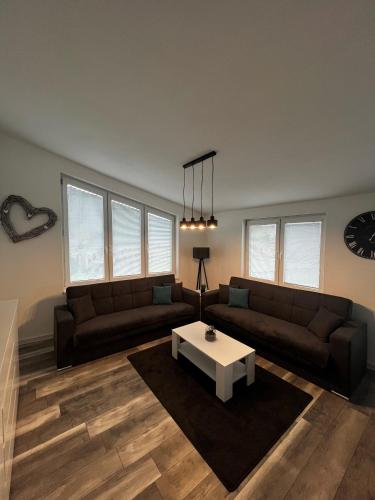 a living room with a couch and a coffee table at Katarína in Kežmarok