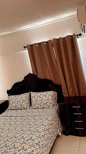 Postel nebo postele na pokoji v ubytování Apartamento en torres del Farallón, SDE, RD