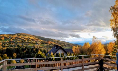a house on a hill with autumn foliage at Level780 in Koszarawa