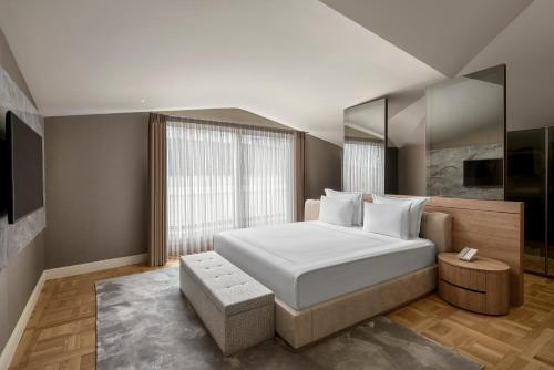 Postel nebo postele na pokoji v ubytování Lazzoni Hotel