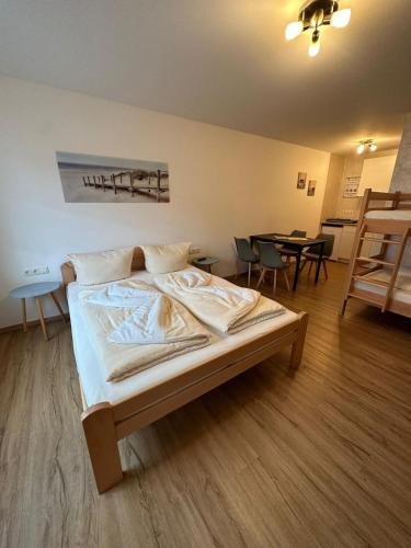 Ένα ή περισσότερα κρεβάτια σε δωμάτιο στο Apartments Marianna