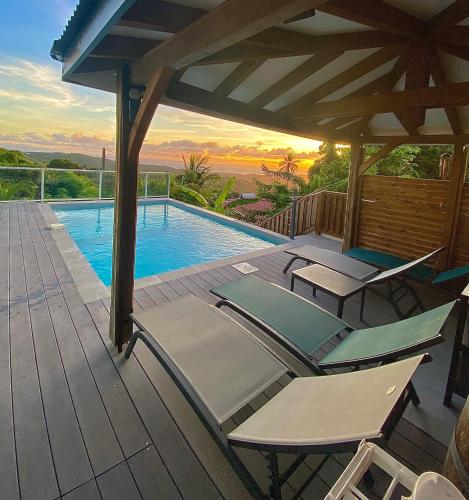 La alberca dentro o cerca de LES VILLAS PAMEYAQUE 2 F2 avec 1 piscine et 1 F3 avec 1 piscine, Superbe Vue sur la mer