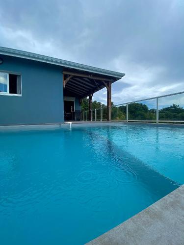 La alberca dentro o cerca de LES VILLAS PAMEYAQUE 2 F2 avec 1 piscine et 1 F3 avec 1 piscine, Superbe Vue sur la mer